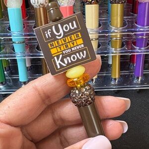 Brown and Yellow Decorative Pen